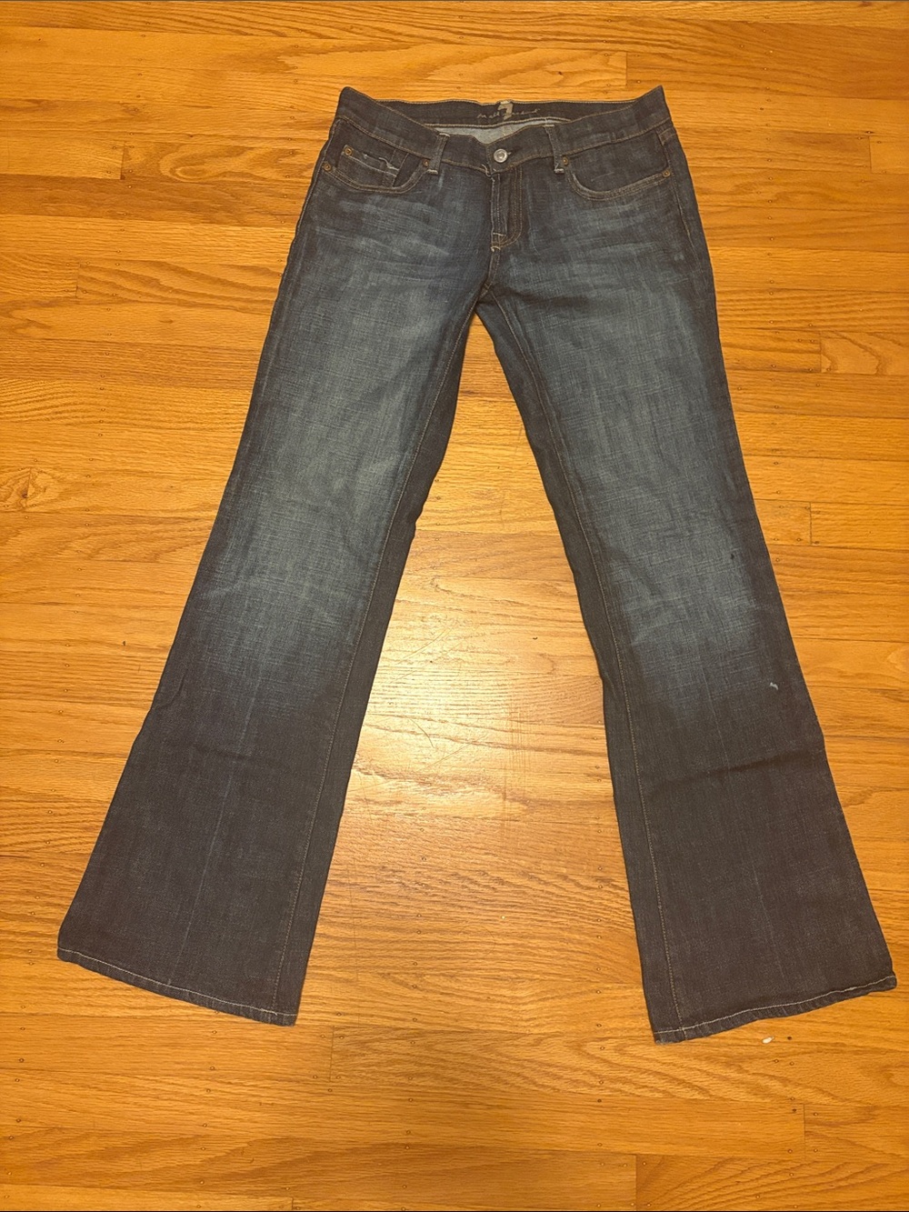7 For All Mankind Dark Blue Low Rise Flare Jeans with pink bedazzling on back